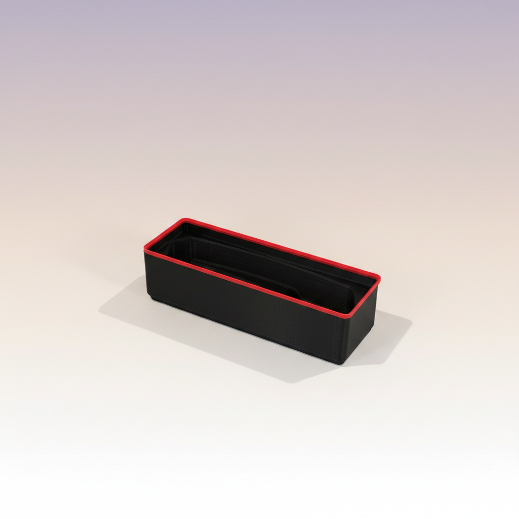 Tool Holder — black 3D-printed bin with red rim and contoured tool cradle