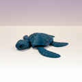 The Sea Turtle — teal-blue articulated 3D-printed sea turtle with detailed shell